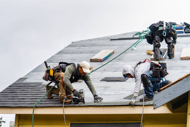 Professional Storm Damage Roof Repair technician working in Karns City, PA
